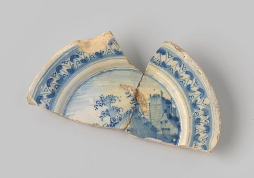 Sherd of yellowish-firing earthenware, glazed white, with a border and a painting of a landscape with a haystack and farms in blue on the front
