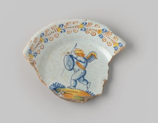 Fragment of White-Fired Earthenware with a Ring Foot, Coated with White Glaze, Depicting a Cupid with Spear and Shield in the Center, and Scrolls on the Border in Orange, Blue, and Yellow