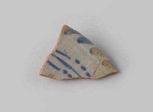 Fragment of Red-Fired Earthenware, Coated with White Glaze, with Stripes and Dots in Blue on the Front