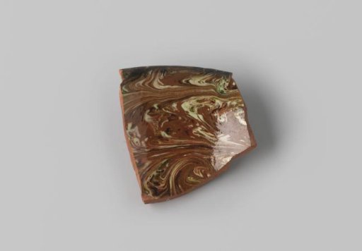 Fragment of Red-Fired Earthenware, Coated with Marbled Glaze in Brown, Beige, and Terra on the Inside and Outside