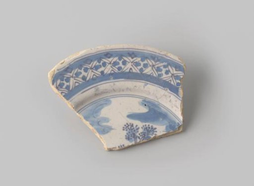 Sherd of yellowish-firing earthenware, glazed white, with a painting of a sky with a tree and a border in blue on the front