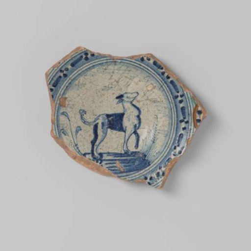 Pottery shard with a drawing of a landscape with an animal (dog or deer?) in blue