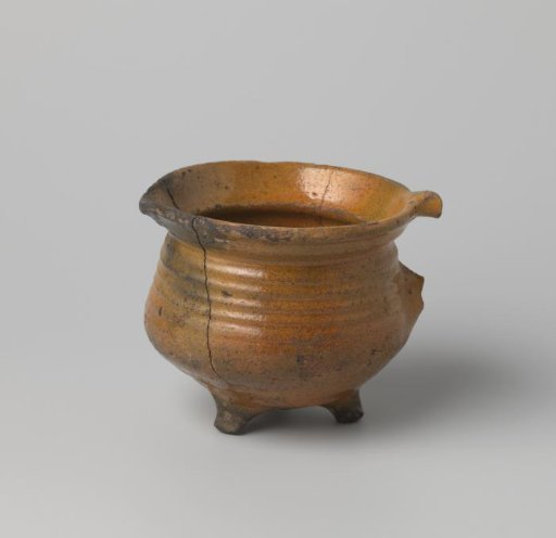 Pot of red-firing clay, glazed green lead on the inside and brown lead on the outside, damaged