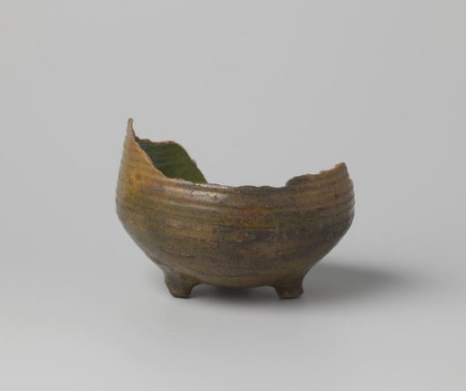 Pot of red-firing clay, glazed green lead on the inside and brown lead on the outside, damaged