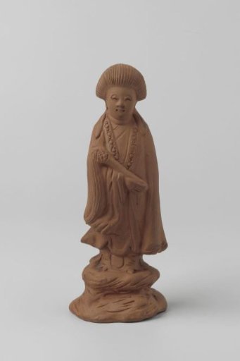 Quan Yin of red stoneware