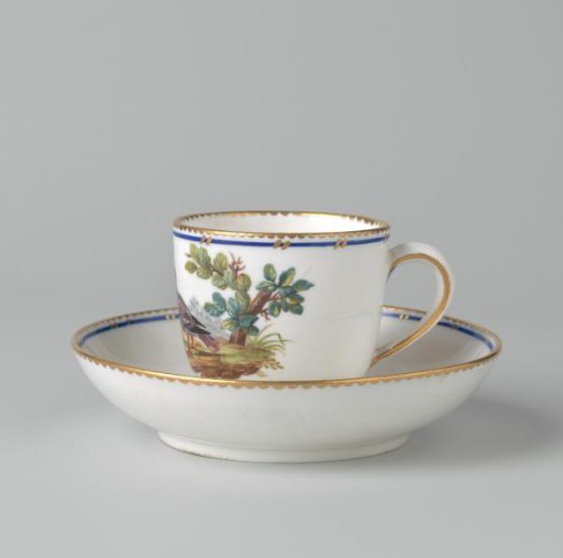 Cup with a bird in a landscape