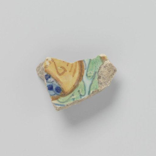 Fragment of a dish decorated with a pomegranate