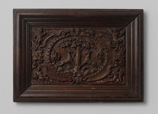 Panel with oval cartouche containing carved strapwork and cherub heads and two climbing stags on either side of a tree, with the four elements in the corners