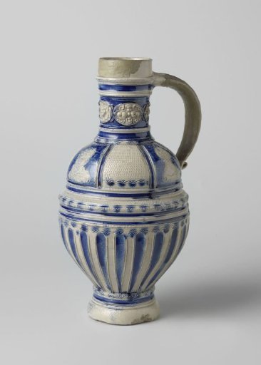 Jug with scrolls, chip carving and roundels