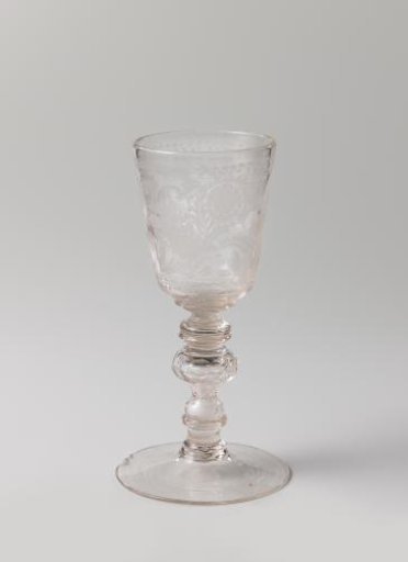 Vase with sunflowers, leafy scrolls and circles