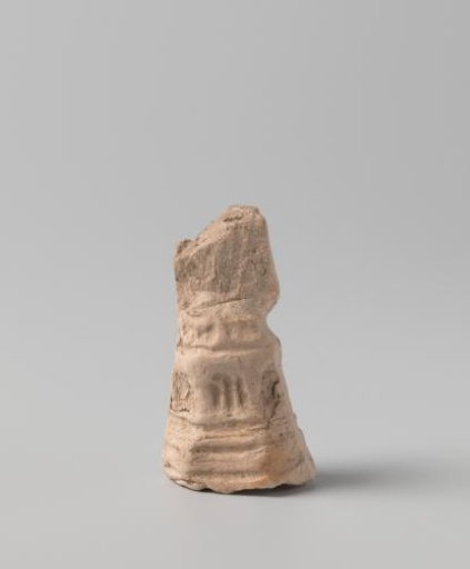 Fragment of a Pipe Clay Figurine