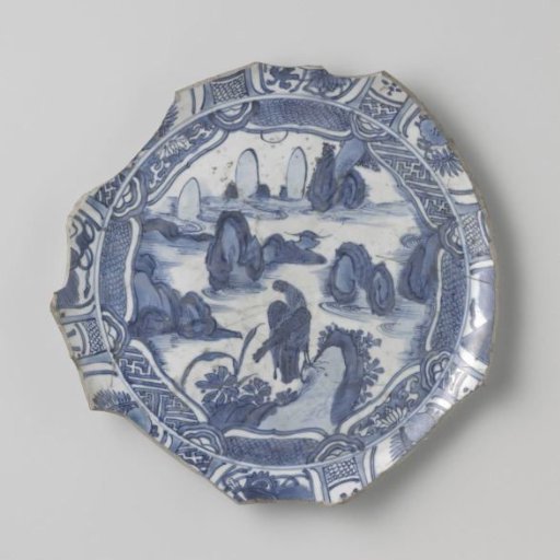 Fragment of a dish with a bird on a rock