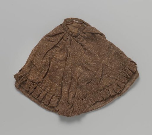 Skirt with pleated flounce with two rosettes at the front.