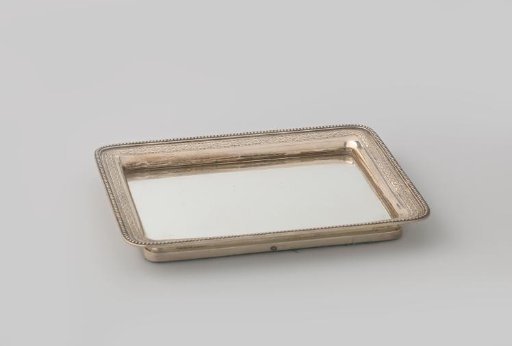 Silver Leaf, with a Base of Mirror Glass. With Pearl Border and Engraved Ornaments. Belonging to Cookie Tin BK-KOG-2604-B-I.