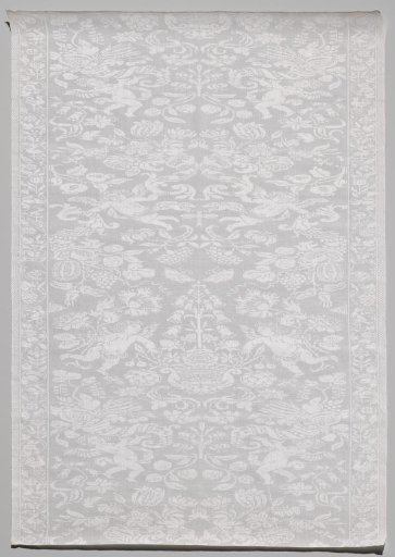 Linen damask napkin with putti and flowers