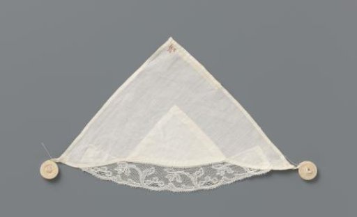 Tablecloth of white linen with lace; marked in red cross-stitch: HS12