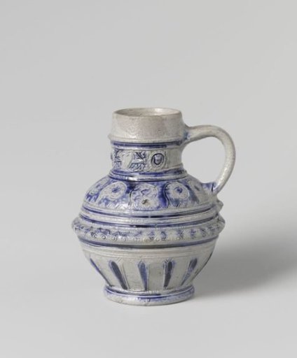 Jug with floral scrolls and masks