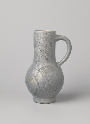 Jug with flowering plants