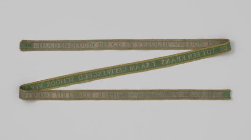 Garter of green silk interwoven with silver thread; with the text: 'YOUTH AND VIRTUE VIRTUE AND JOY JOY AND YOUTH TO A CROWN T TOGETHER TWISTED BEAUTIFULLY MIXED THAT MIXING ANGELICALLY TRUE BY CHANCE W V MAURIK'