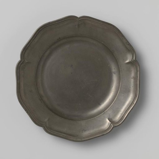 Plate with a carved edge
