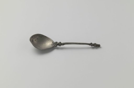 Tin Spoon with Mascarons