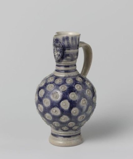 Jug with a mask and medallions