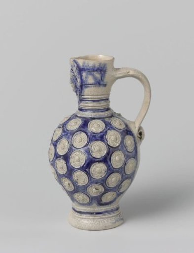 Jug with a mask and medallions