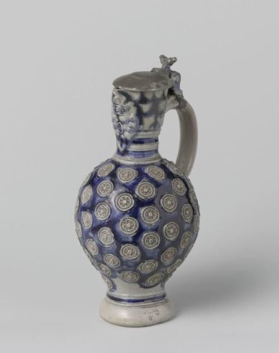 Jug with a mask and medallions