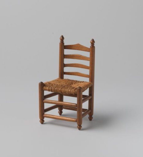Knob chair with seat of woven reed