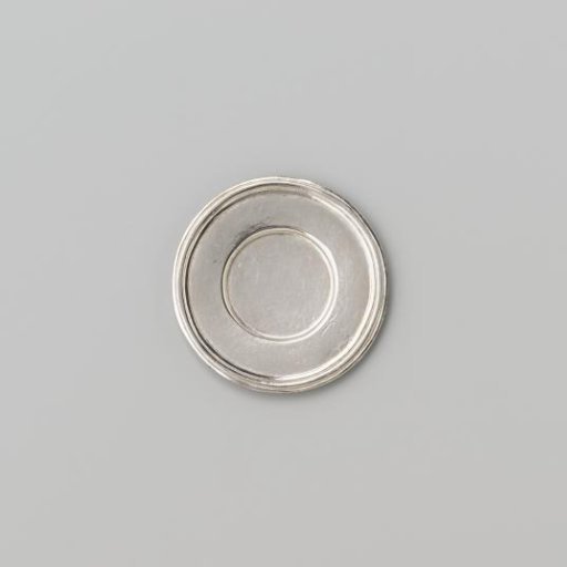 Silver-coloured small plate with broad flat profiled rim.