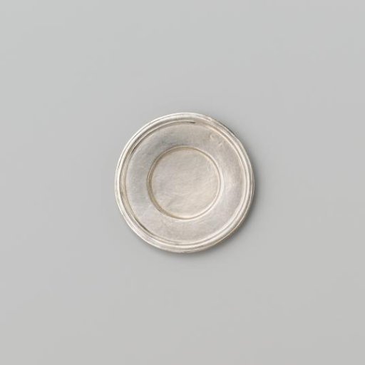Silver-coloured small plate with broad flat profiled rim.