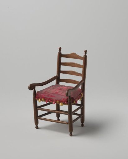 Armchair (knob chair model) of walnut wood with smooth, turned stiles and cross rails, front legs and back stiles ending in finely turned knobs