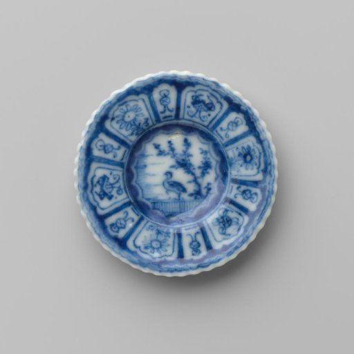 Plate with a bird in a landscape