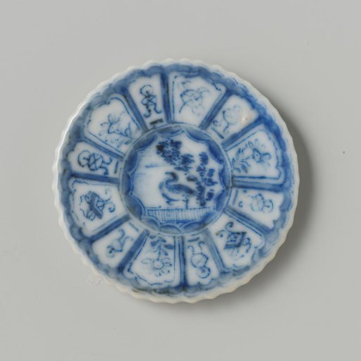 Plate with a bird in a landscape