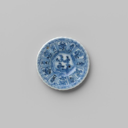 Plate with a bird in a landscape