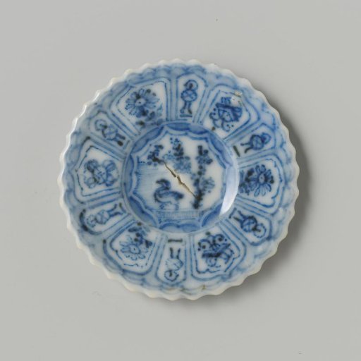 Plate with a bird in a landscape