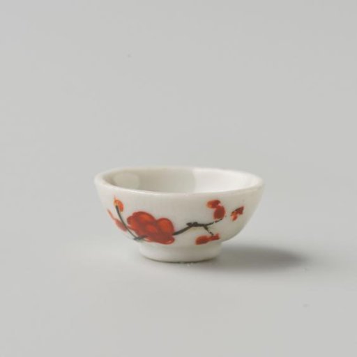 Porcelain bowl with polychrome decoration in Kakiemon style, flowering branch on the outside of the bowl
