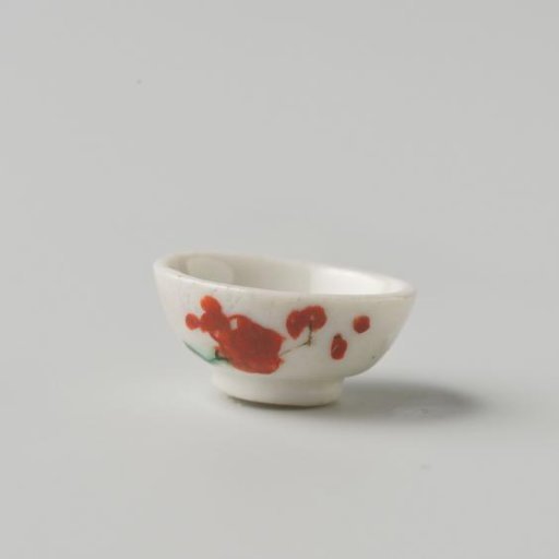Porcelain bowl with polychrome decoration in Kakiemon style, flowering branch on the outside of the bowl