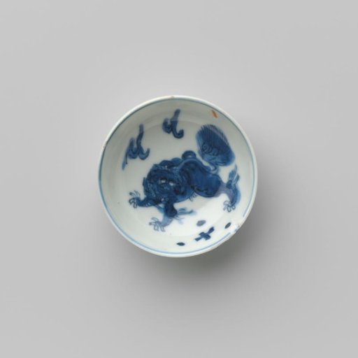 Miniature saucer-dish with a shishi and branches