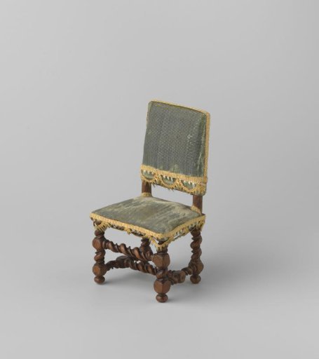 Armchair made of walnut wood; stiles, front rail and H-shaped cross decorated with narrow and broad twist