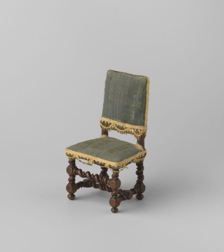 Armchair made of walnut wood; stiles, front rail and H-shaped cross decorated with narrow and broad twist