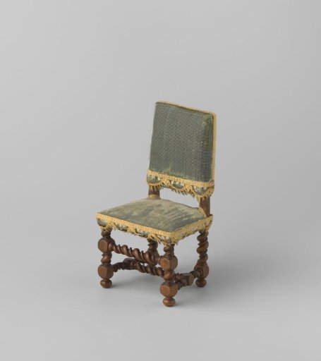 Armchair made of walnut wood; stiles, front rail and H-shaped cross decorated with narrow and broad twist