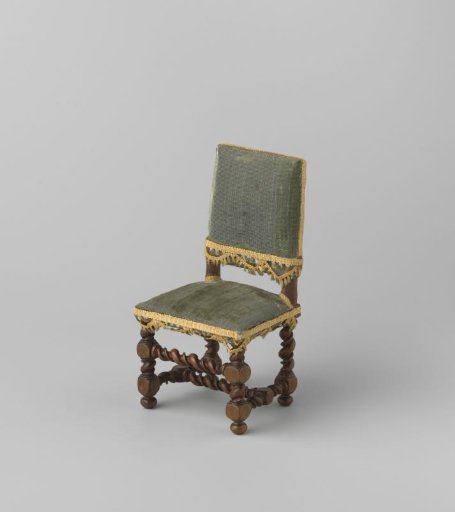 Armchair made of walnut wood; stiles, front rail and H-shaped cross decorated with narrow and broad twist
