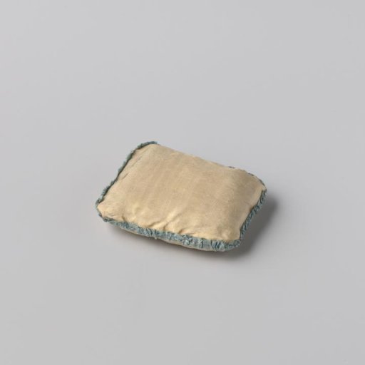 Rectangular cushion made of light yellow silk