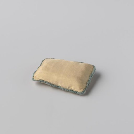 Rectangular cushion made of light yellow silk