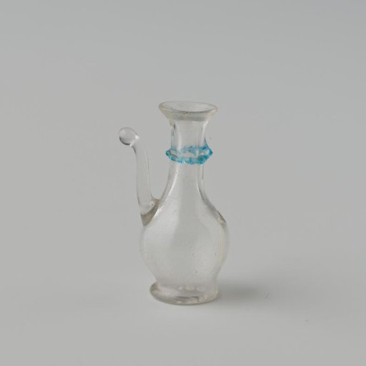 Jug of clear colourless glass, smooth slender model on a flat slightly outward curved base; blue pinched neck ring, S-shaped solid spout and handle.