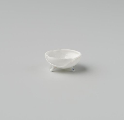 Bowl of opaque white glass (probably imitation white earthenware); double-walled bowl on three feet.