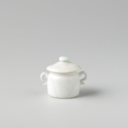 Lidded pot of opaque white glass