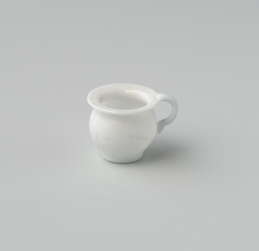 Chamber pot of opaque white glass (probably imitation white earthenware); fairly tall model with indented base, flat rim and an applied handle.