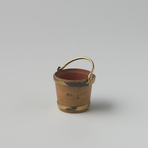 Wooden bucket with copper hoops at top and bottom, handle attached to the upper hoop
